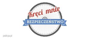 Okrągły baner z napisem "Kręci mnie bezpieczeństwo".